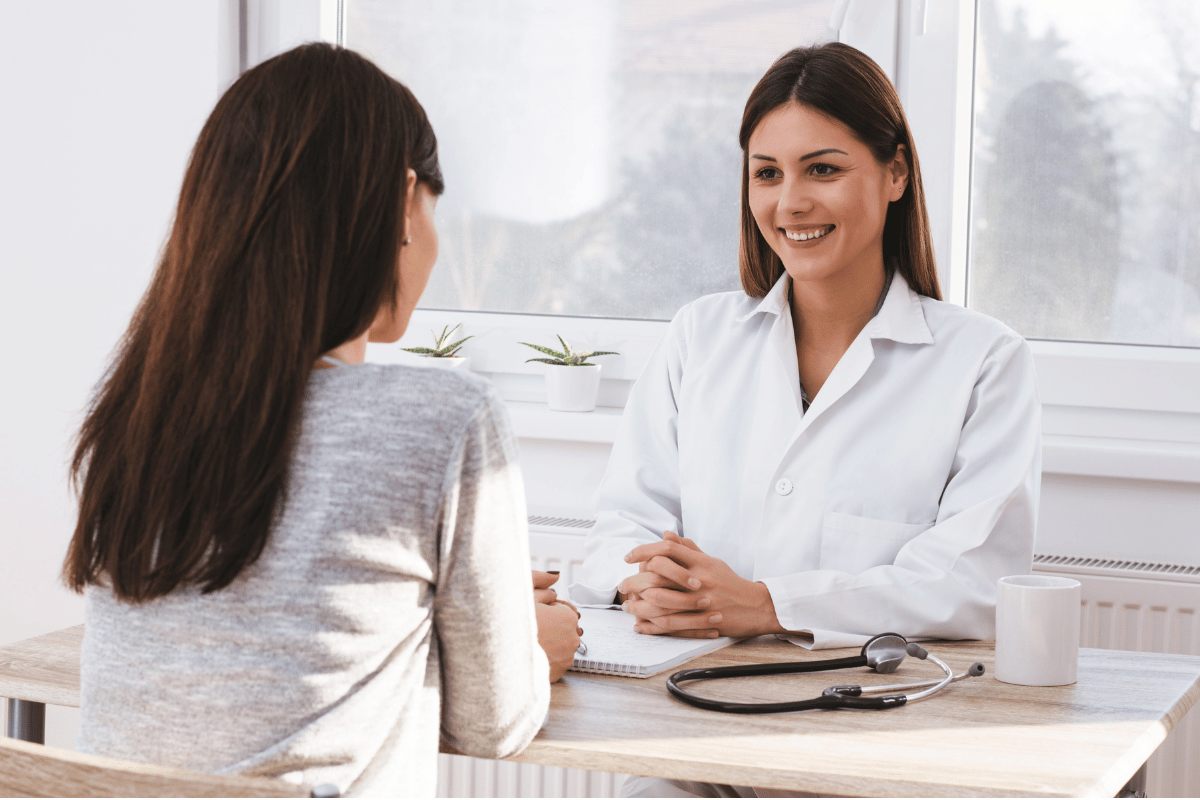 female doctor consulting a female patient